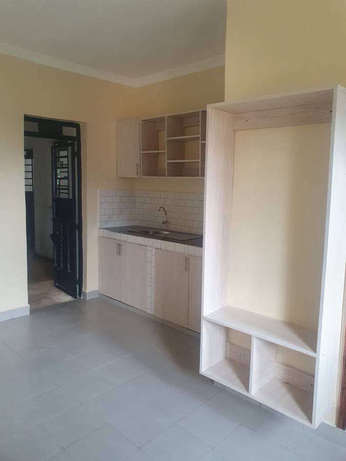 Interior of studio apartment room at The Wave