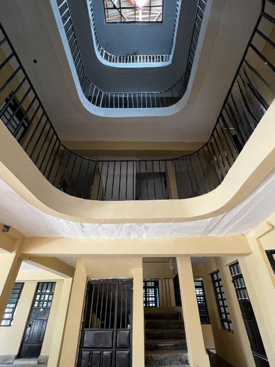 Dramatic stairwell atrium inside The Wave apartments building